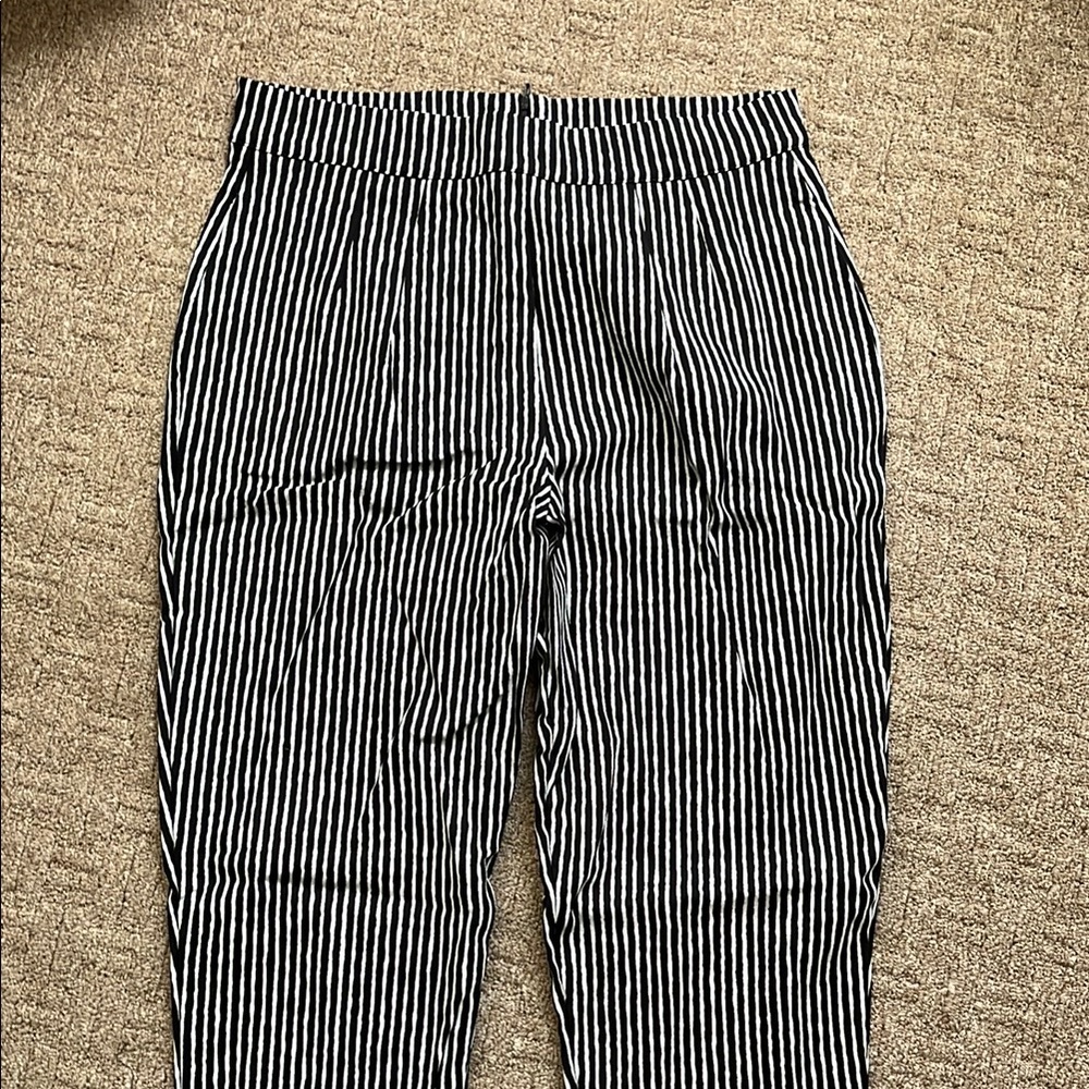 Cigarette pants in black stripes